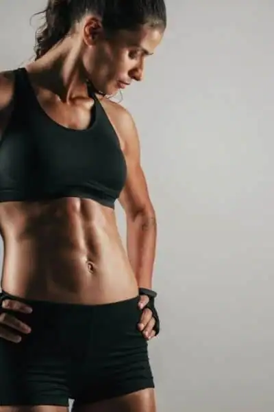Toning Up at Home: The Ultimate Guide to Bodyweight Exercises 2 Image of woman's toned stomach after bodyweight exercises Ashford and non-surgical treatment from Lipo 360
