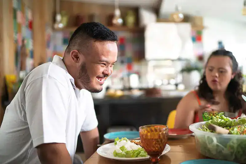 Empowering Weight Loss: A Comprehensive Guide for Individuals with Disabilities 2 Image of a disabled man and balance around nutrition to aid weight loss Ashford