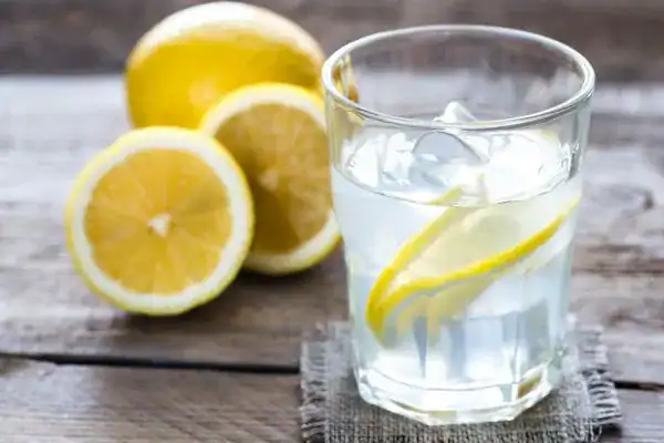 Hydration: The Secret Ingredient for a Toned Stomach and Enhanced Fitness 2 Image of lemon water to aid hydration Ashford