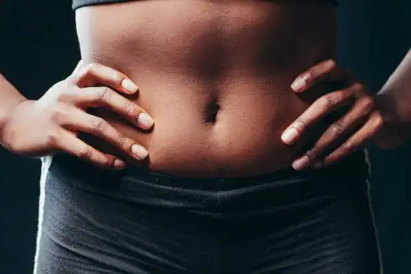 Toning Your Stomach: The Ultimate Guide to Achieving a Sculpted Stomach While Shedding Pounds 1 Image of a toned stomach after non surgical treatment Ashford